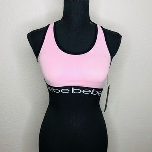 bebe light pink and black sports bra